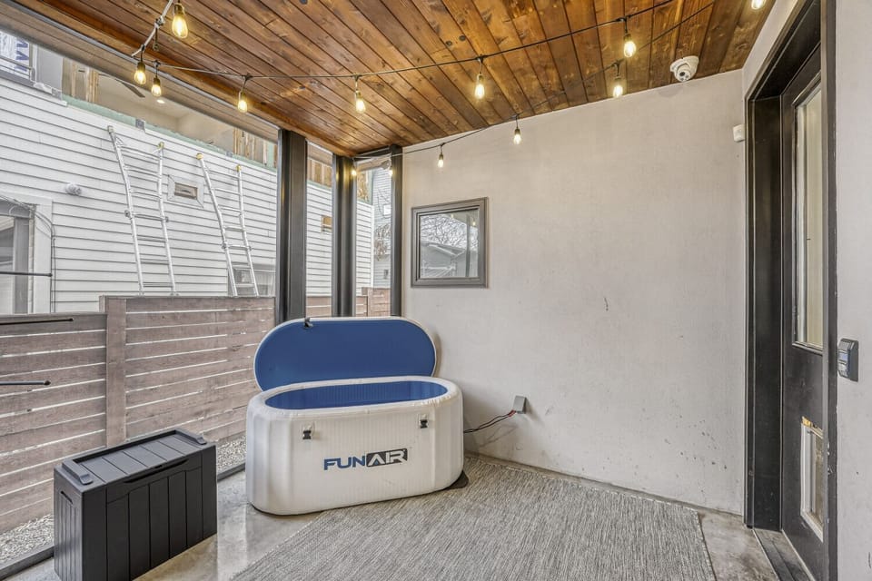 Cold plunge tub and hot tub wellness area.