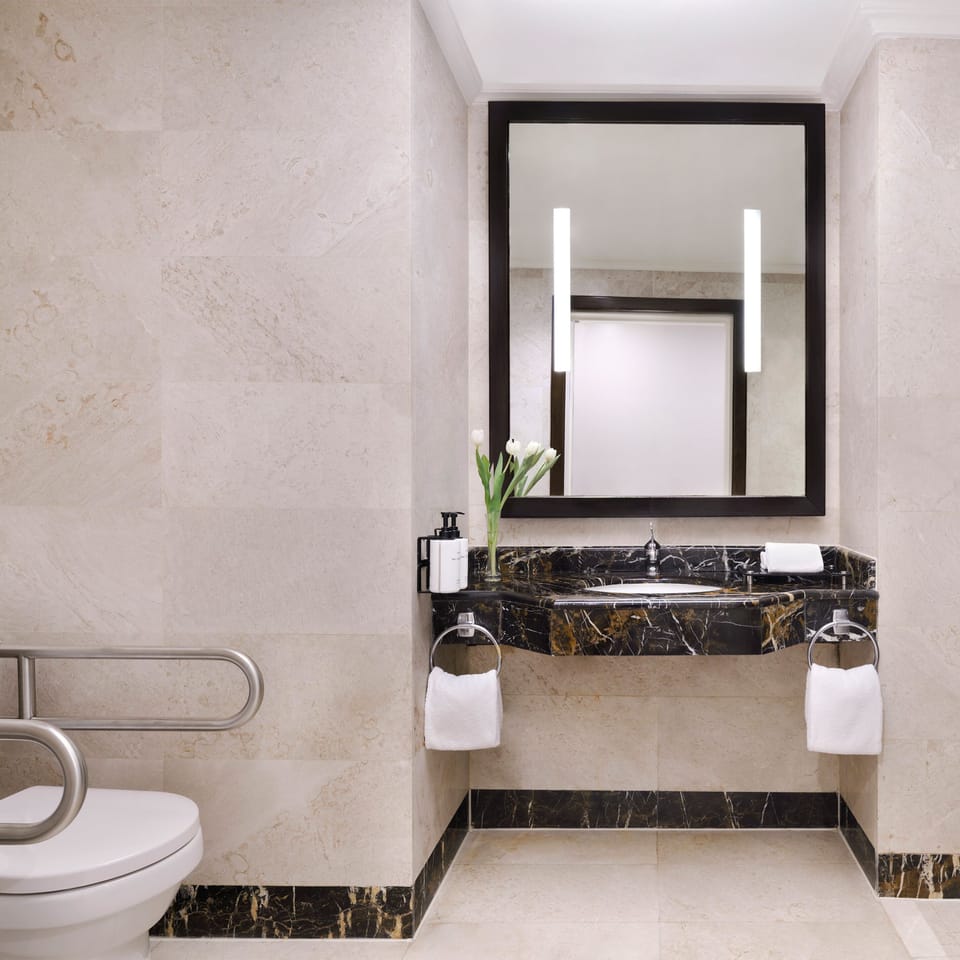 Combined shower/tub, hair dryer, bathrobes, slippers