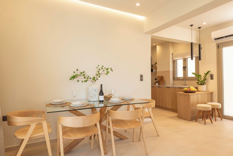Bright & airy open-plan living and dining area, blending comfort and character.