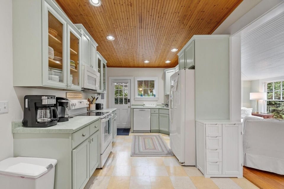 The kitchen has newly finished floors everything you will need for your stay