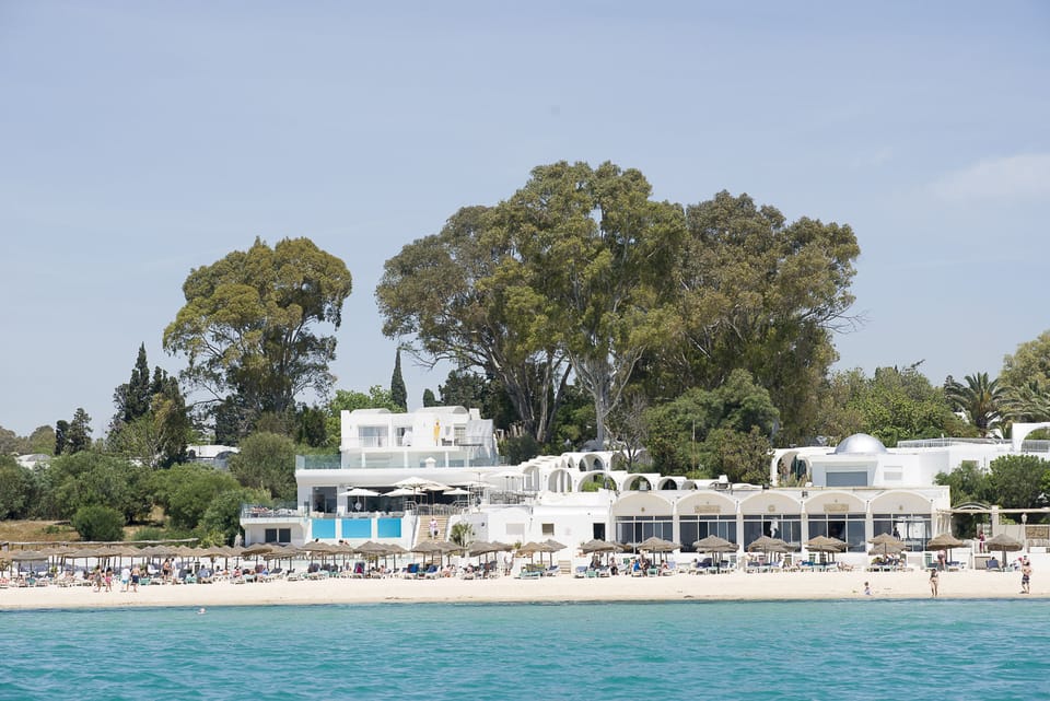 Private beach, white sand, sun loungers, beach umbrellas