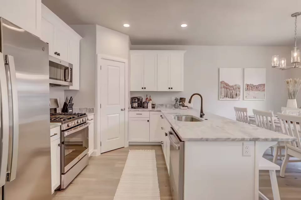 Cook like a pro in this fully-equipped kitchen with brand new appliances, perfect for any culinary adventure.