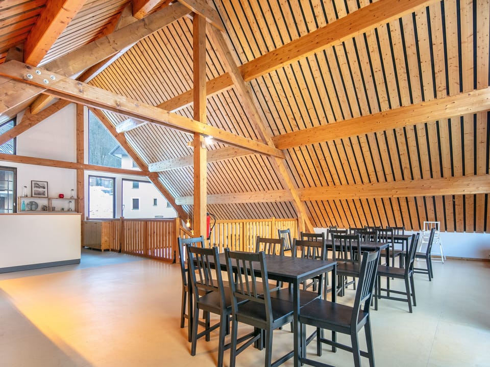 Enjoy a warm sense of community in this inviting space, where authentic Savoyard decor meets stunning mountain vistas, perfect for relaxing after a day of adventure.