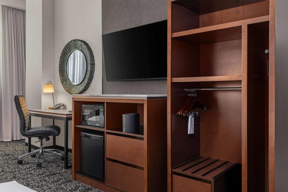 Premium bedding, desk, blackout drapes, iron/ironing board