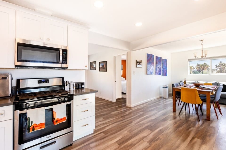 Kitchen | Stainless Steel Appliances | Open Layout & Dining Area