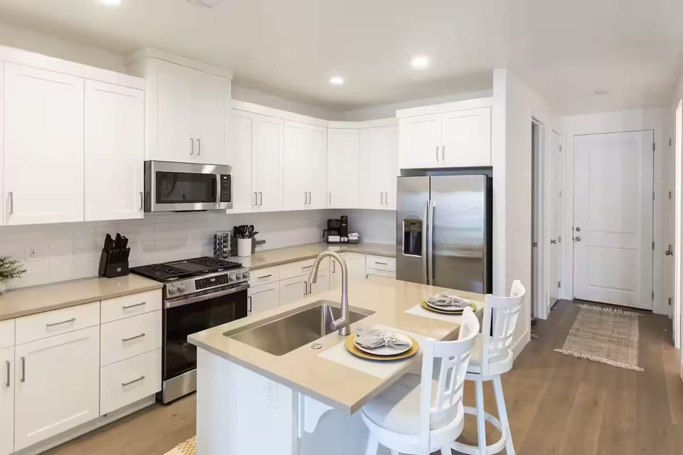 Cook like a pro in this fully-equipped kitchen with brand new appliances, perfect for any culinary adventure.