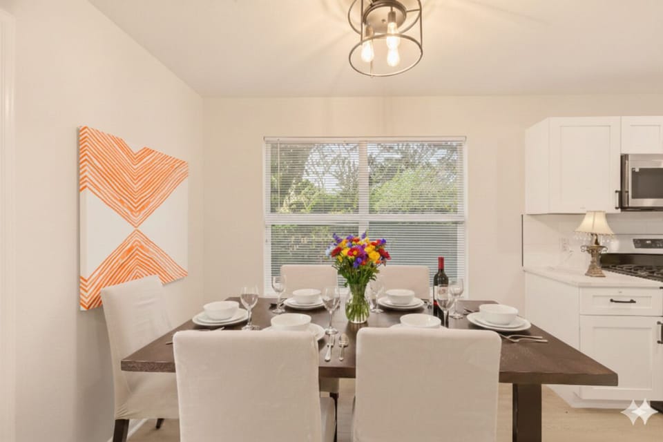 big dining room has table for 6, dining wear, utensils, cookware, wine glass, cups for your cooking.