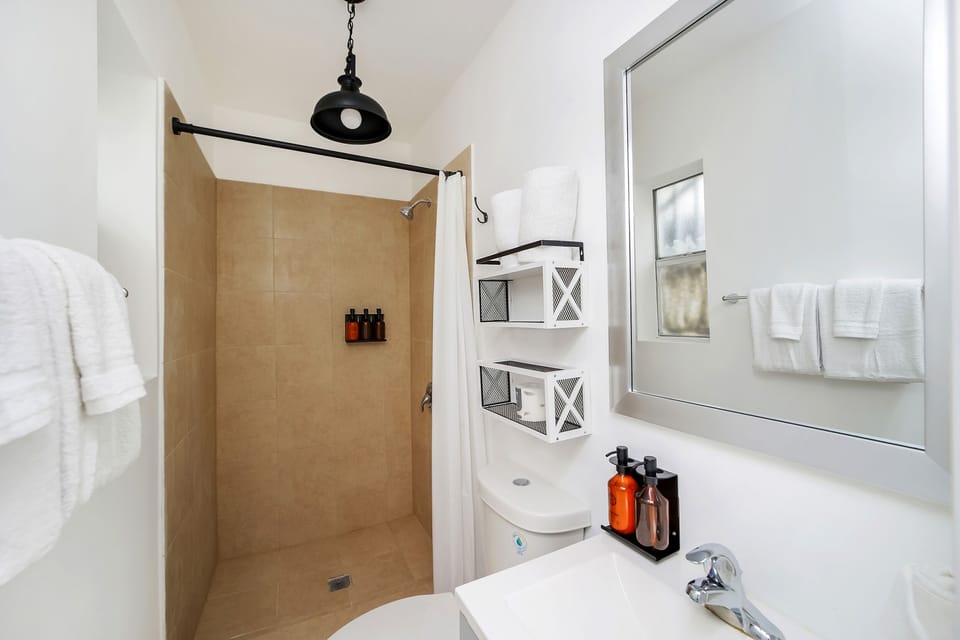 Family Suite, Multiple Beds, Private Bathroom (Self check-in) | Bathroom | Shower, hair dryer, towels, soap