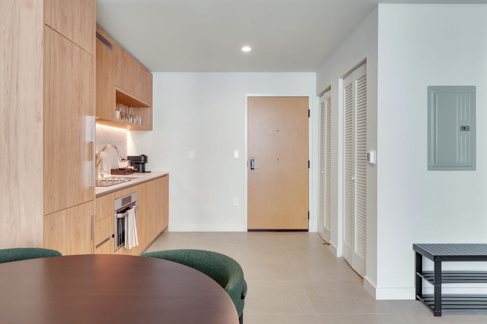 Entryway with kitchen and storage