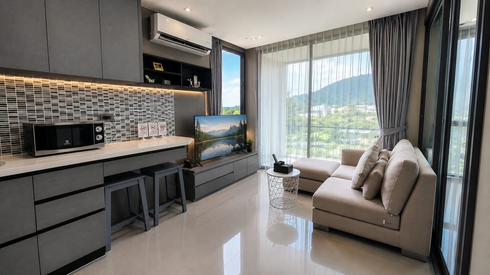 Deluxe Apartment, 1 Bedroom (Chic n Cozy CityGate 1BR Suite) | Living room | Flat-screen TV