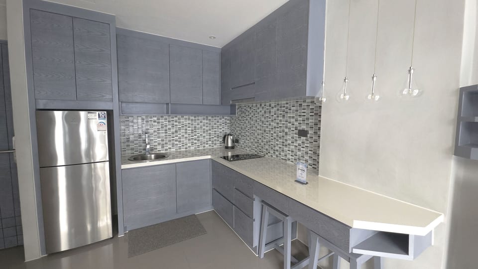 Apartment, 1 Bedroom (CityGate Kamala 1BR Oasis Suite) | Private kitchen | Electric kettle