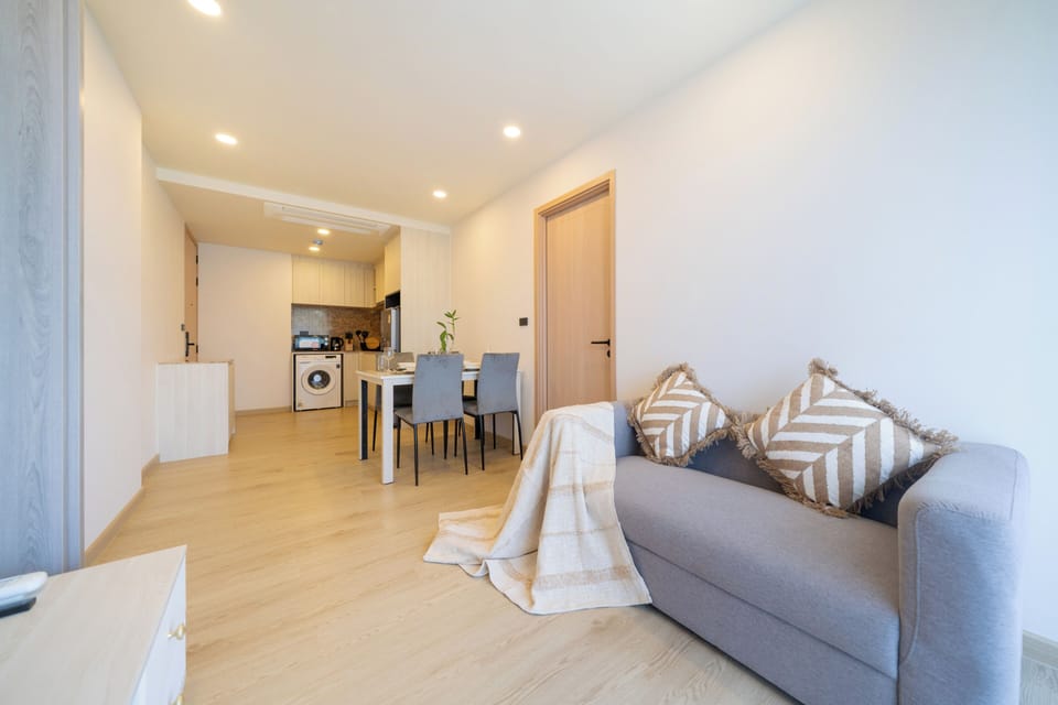 Apartment, 1 Bedroom (Ozone Condo Prestigious Laguna Area) | Living area | 55-inch LED TV with digital channels