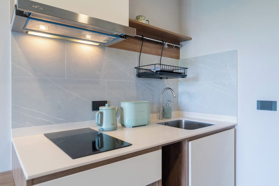 Apartment, 1 Bedroom (Space Cherngtalay in Elegant BangTao) | Private kitchen | Full-size fridge, microwave, stovetop, electric kettle
