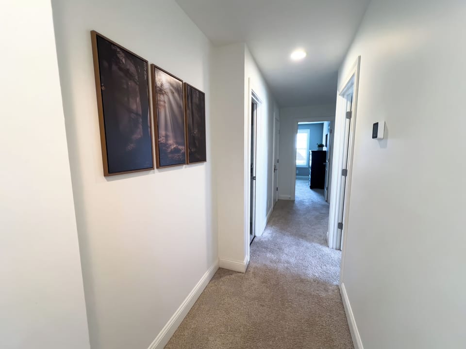 Upstairs hallway to bedrooms, bathroom and bonus room