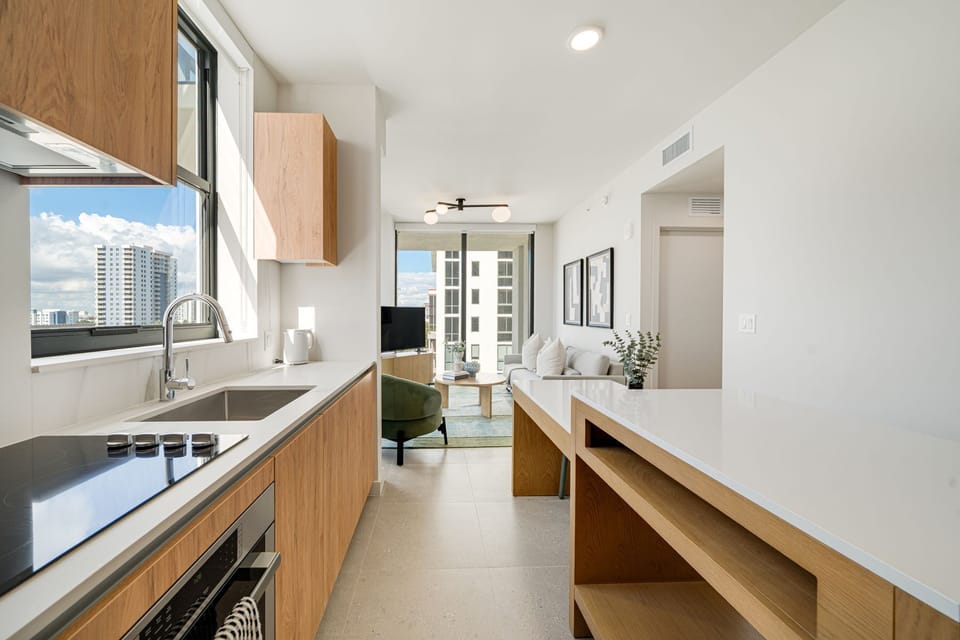 Sleek chef’s kitchen with island seating