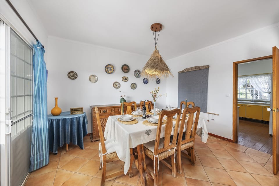 Dinning area and nearby kitchen