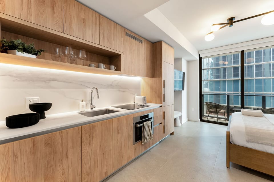 Sleek modern kitchen with warm wood finishes