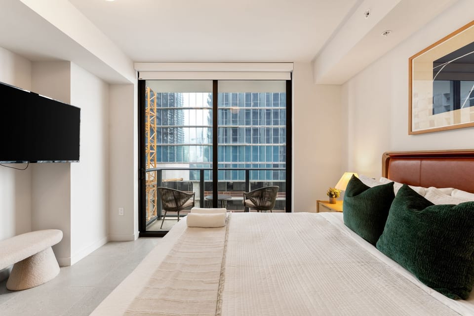 Bright bedroom with balcony access