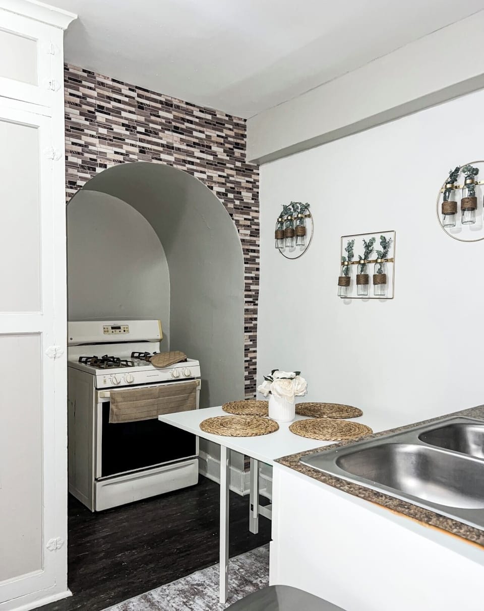 Full size stove and oven. Cooking and dishes utensils included.