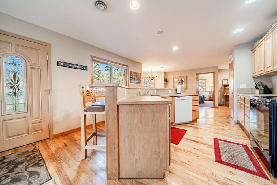 A spacious kitchen that`s well stocked for all your cooking!