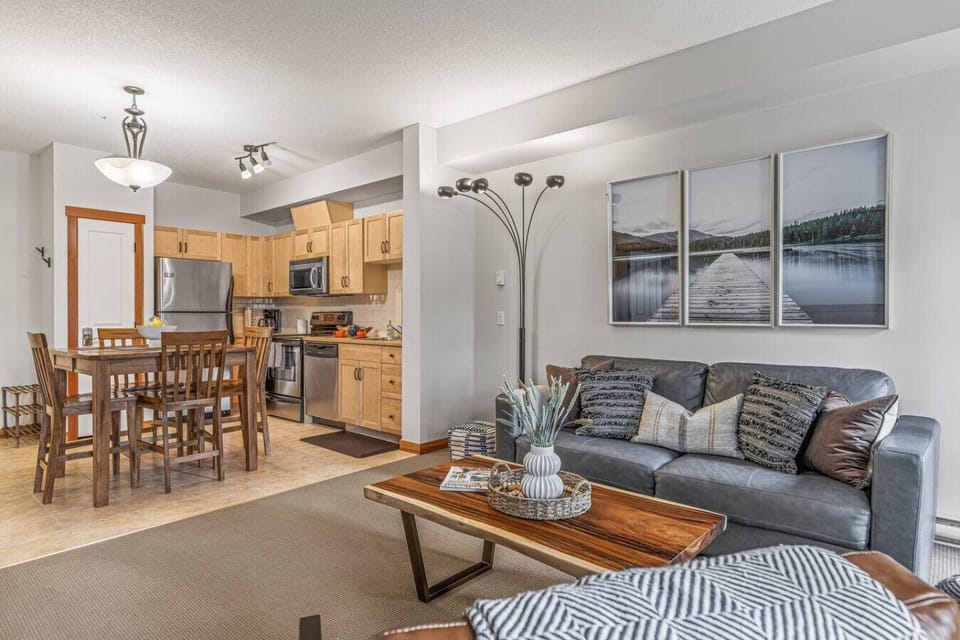 Fully equipped kitchen with 4-seater dining and cozy living area perfect to enjoy family time