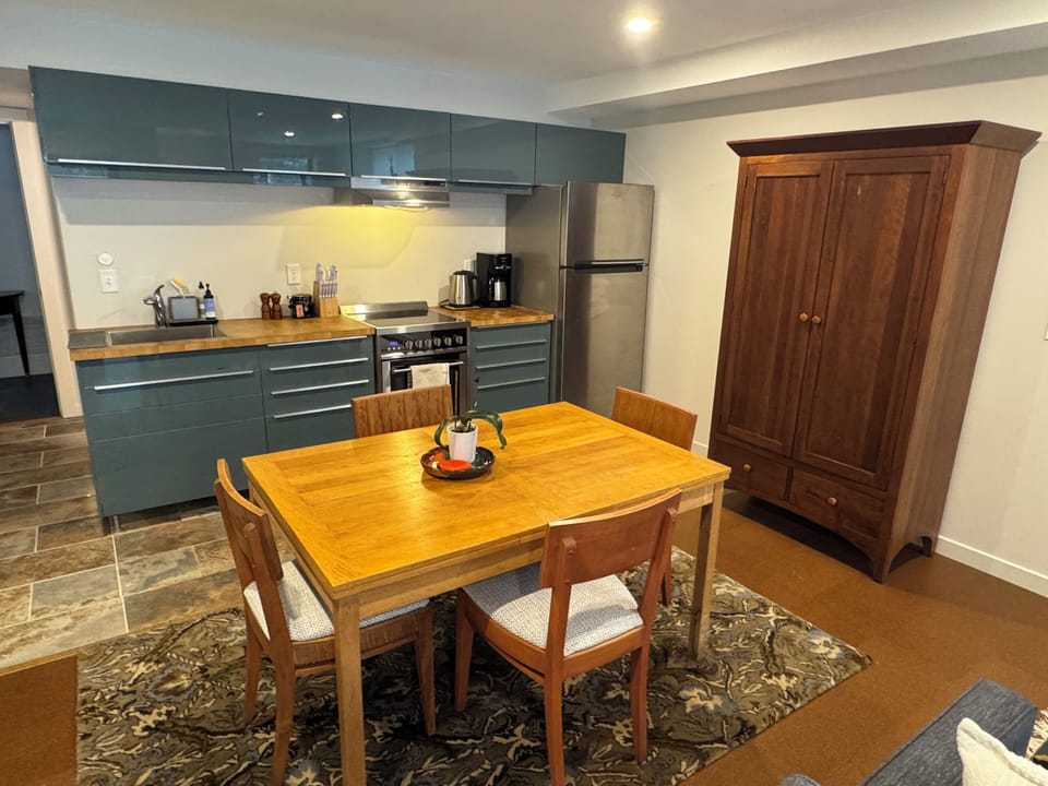 The full sized kitchen is stocked with coffee, tea and popcorn