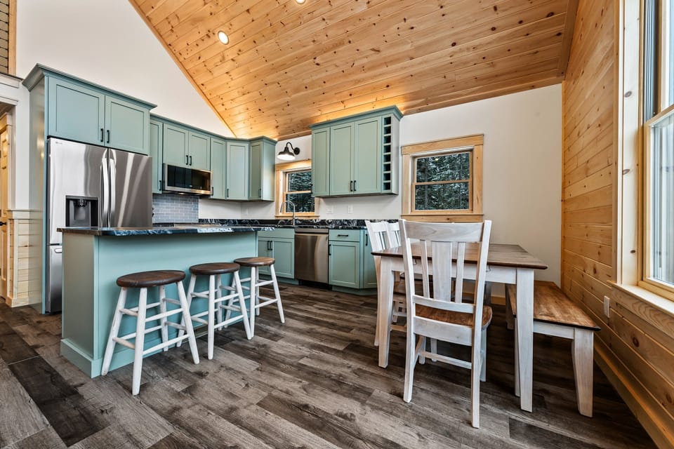 Kitchen and dining area with lots of seating