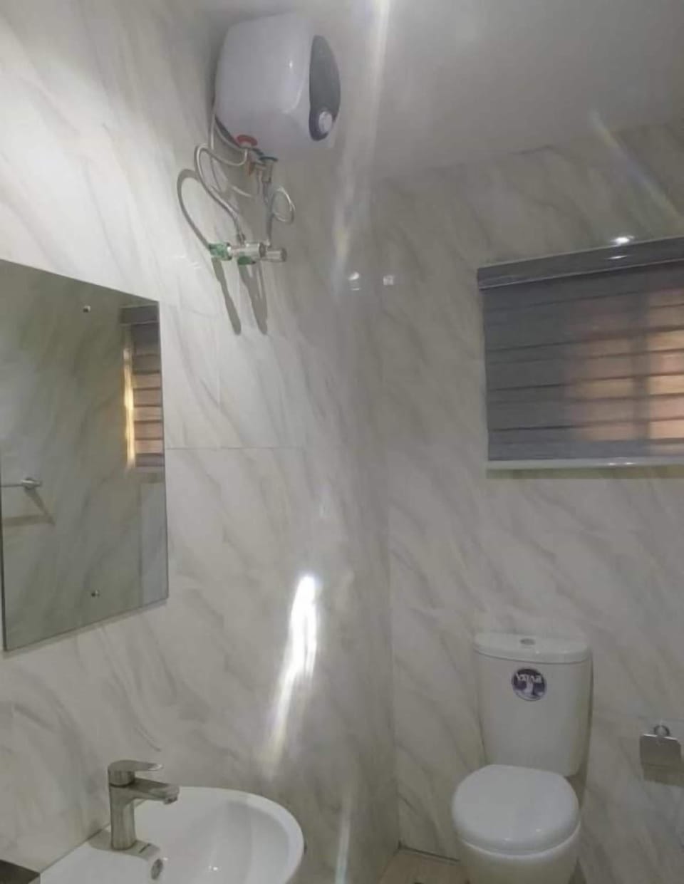 Shower, towels, toilet paper