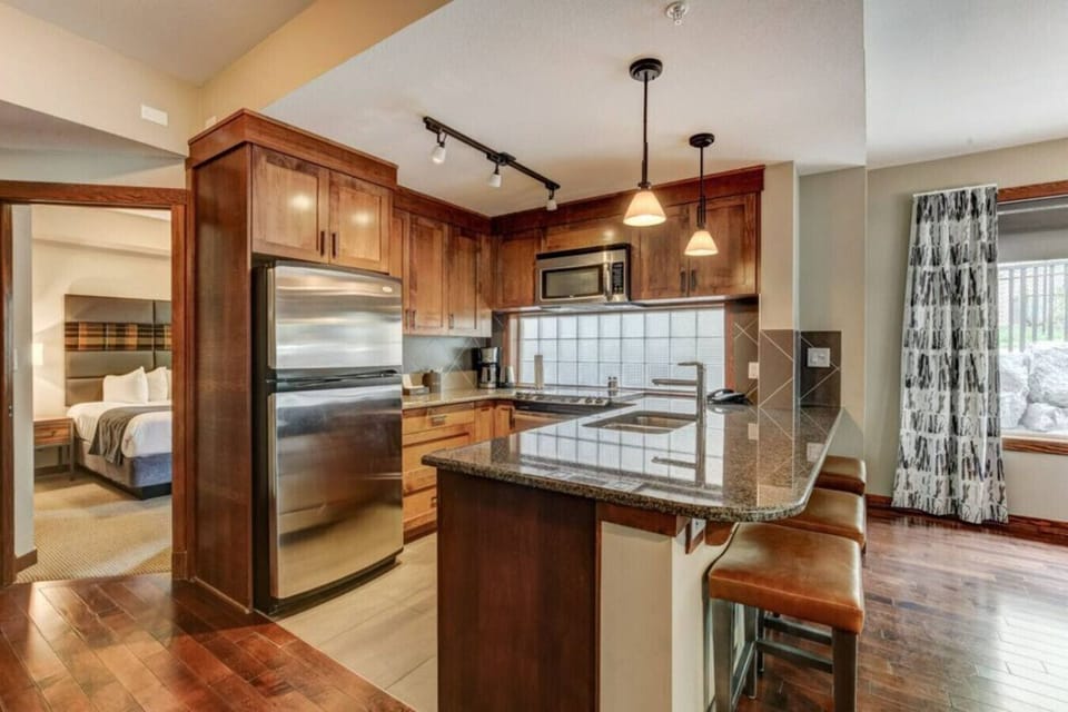 Kitchen and lounge area, open space concept.