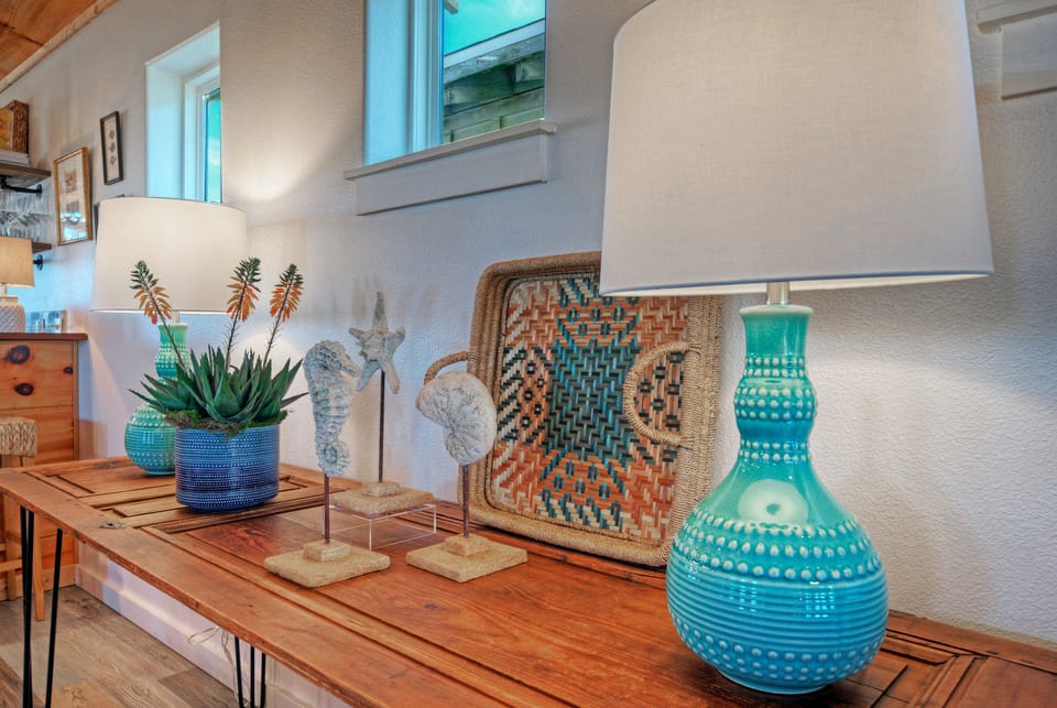 Charming decor fills the living and dining areas.