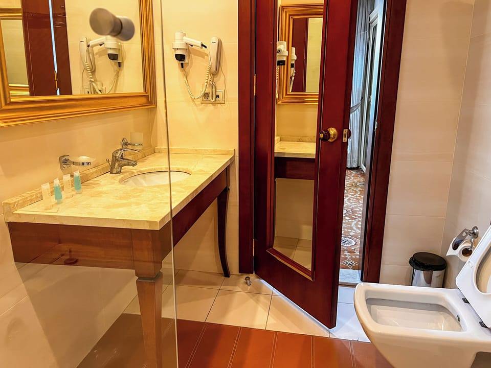 Royal Suite, City View | Bathroom | Rainfall showerhead, free toiletries, hair dryer, slippers