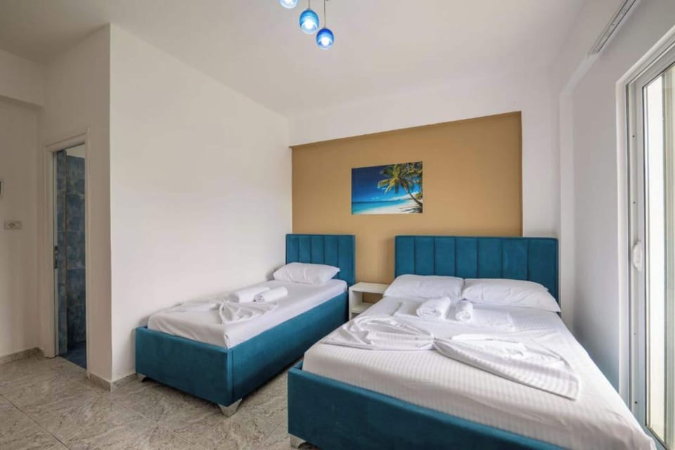 Triple Room, Balcony, Garden View | Soundproofing, WiFi (free), bed sheets