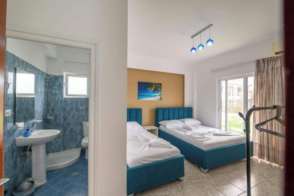 Triple Room, Balcony, Garden View | Free WiFi, bed sheets