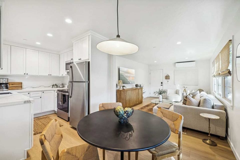 Bright dining area with seating for four.