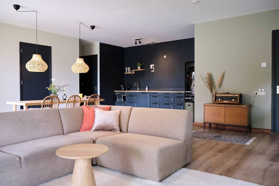 The living room is spacious and has lots of space to relax