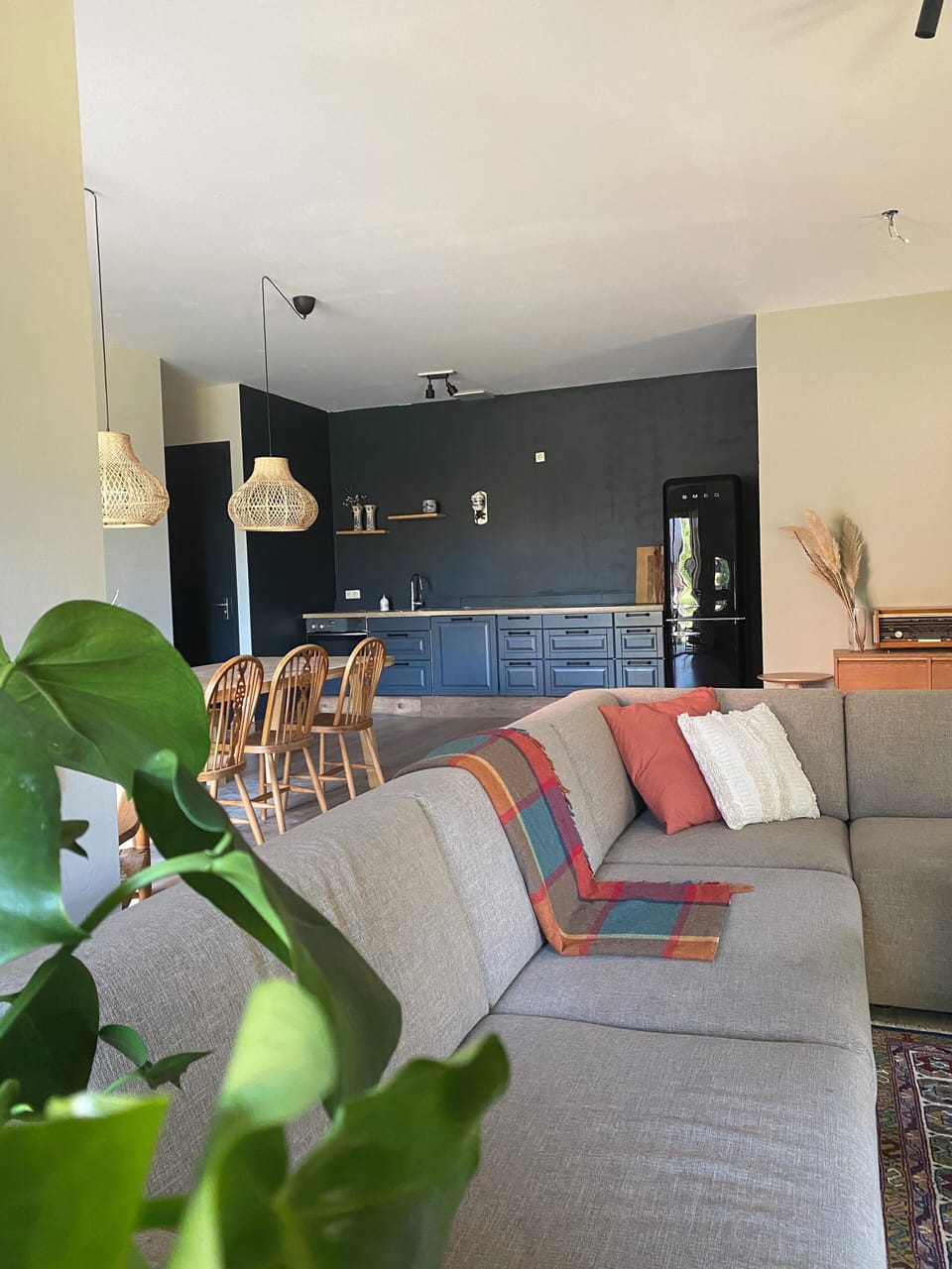 The living room is spacious and has lots of space to relax