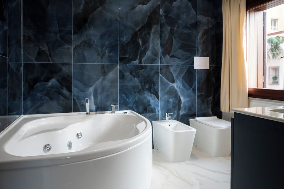 Double Room, City View | Bathroom | Free toiletries, hair dryer, slippers, bidet