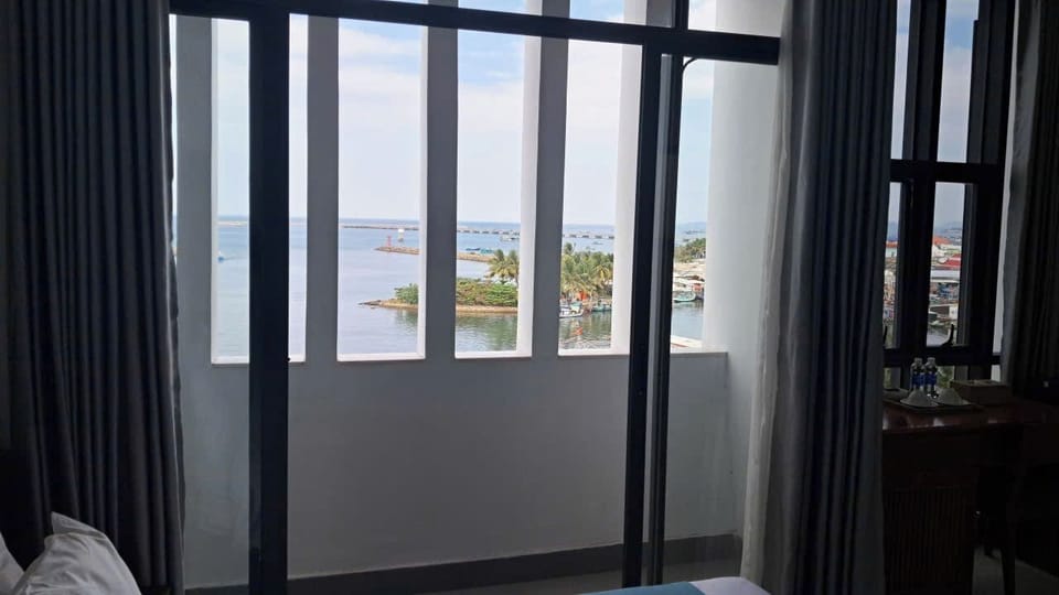 Deluxe Double Room, Beach View | Desk, free WiFi