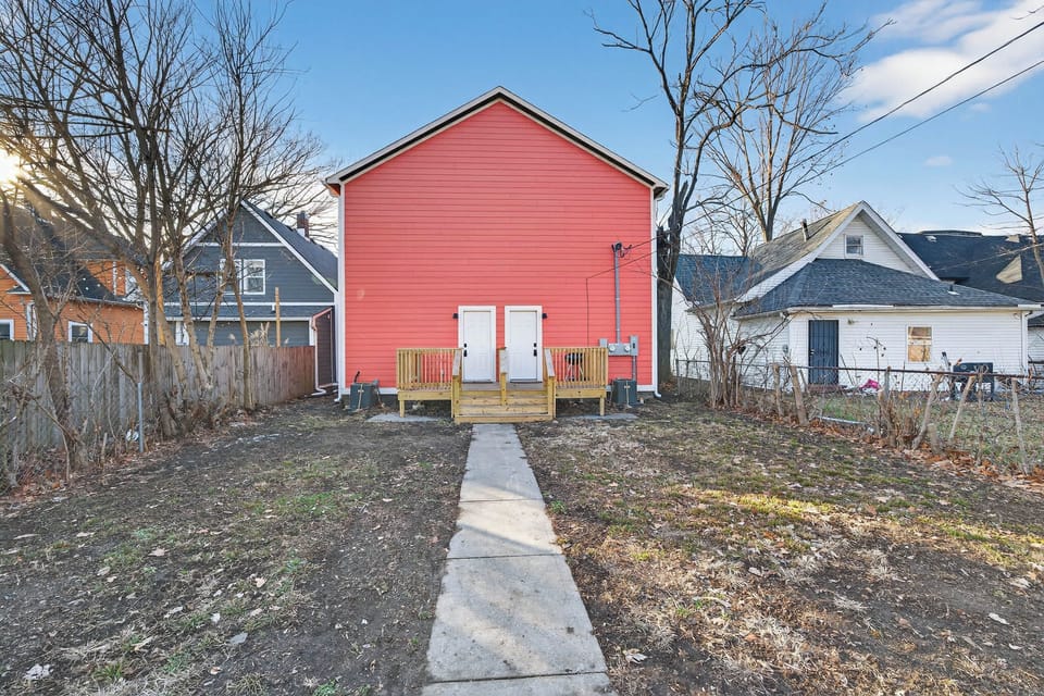 View of Rear Entry from Parking Pad - Your Door is on the Right Side  