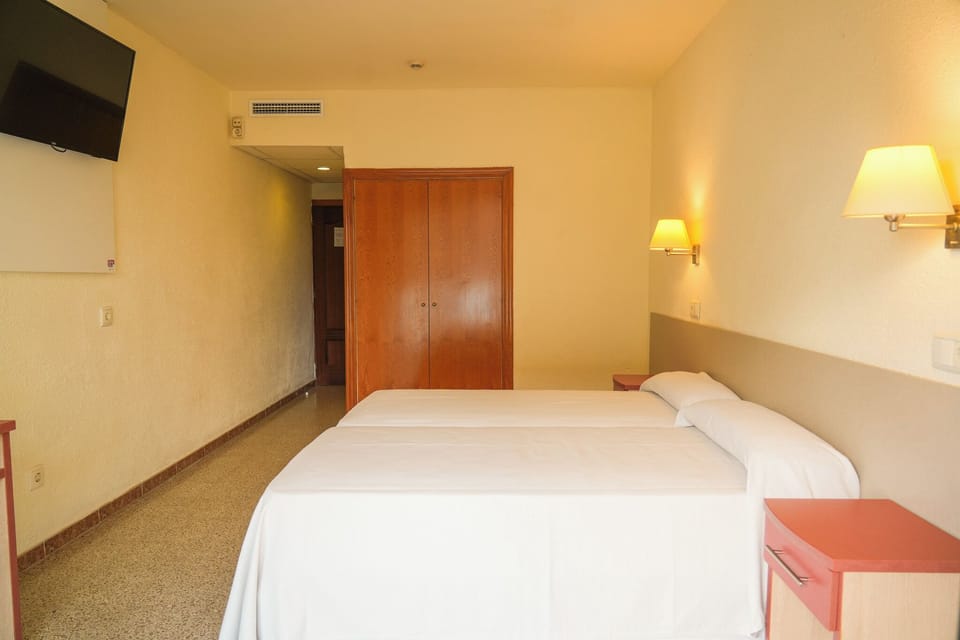 Desk, free WiFi, bed sheets