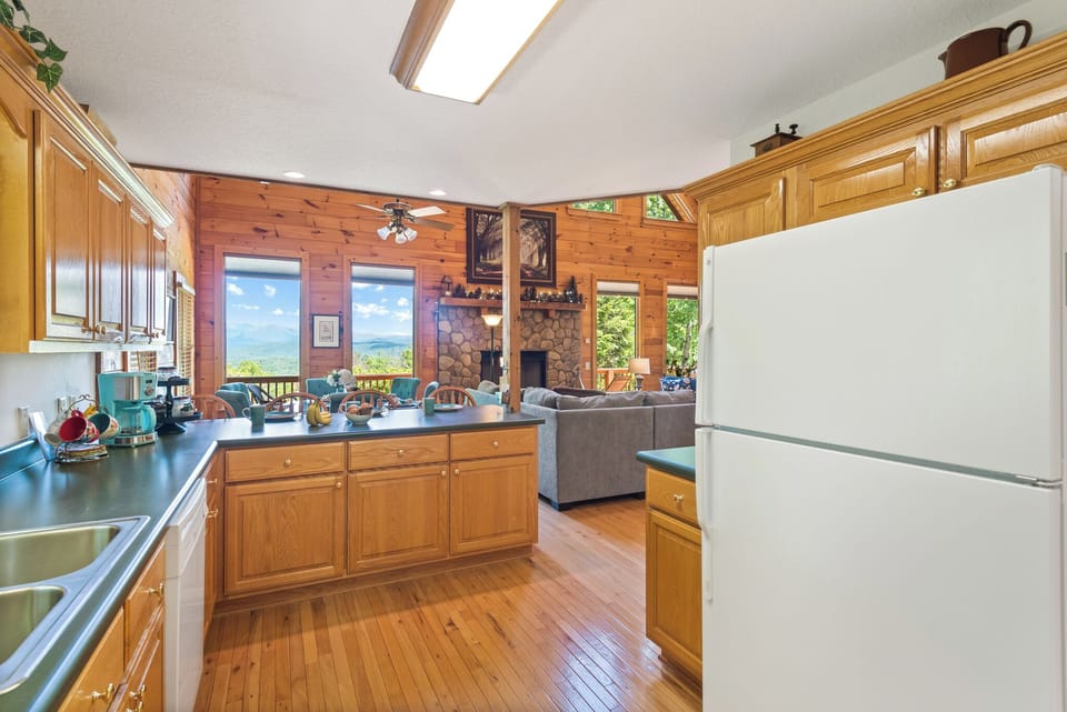 Fully stocked kitchen with generous counter space for group meals and shared mornings.