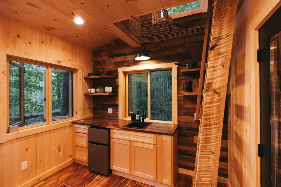 Kitchen and ladder to the loft