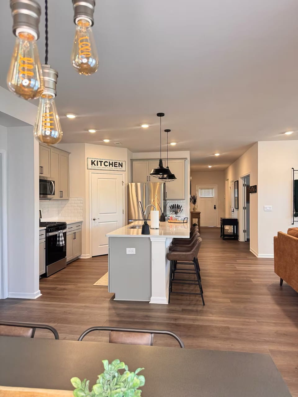 Full Kitchen: open concept, large island, fully equipped with kitchenware.