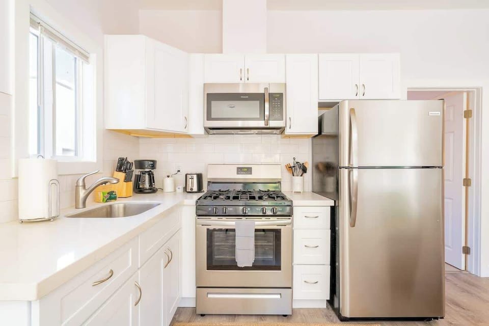 The kitchen comes well equipped with stainless steel appliances 