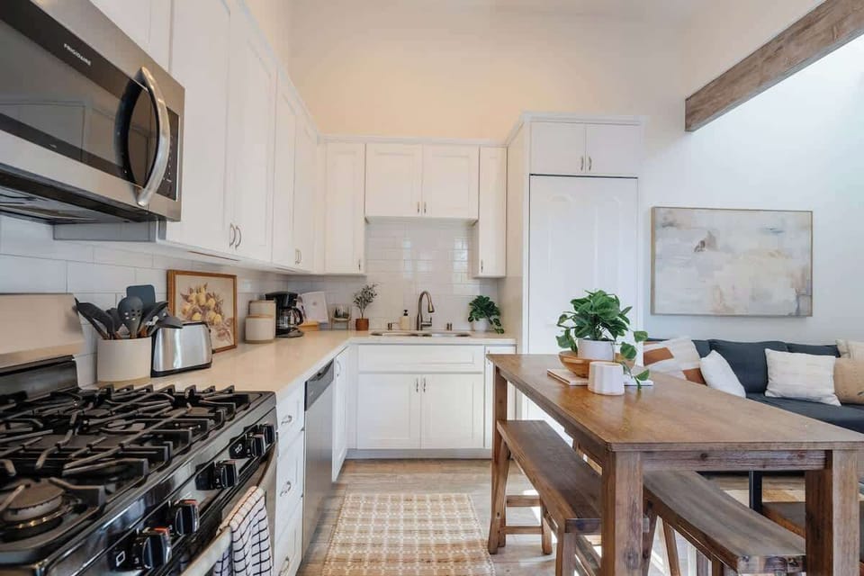 The modern kitchen comes fully equipped for your stay