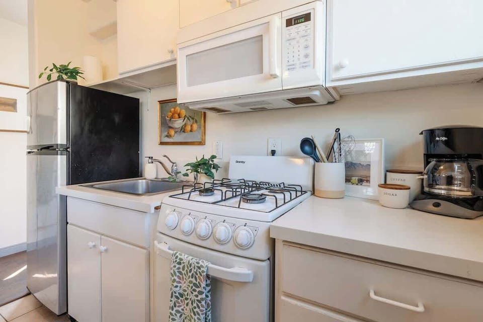 Cook in the charming kitchen that comes fully equipped with all the essentials