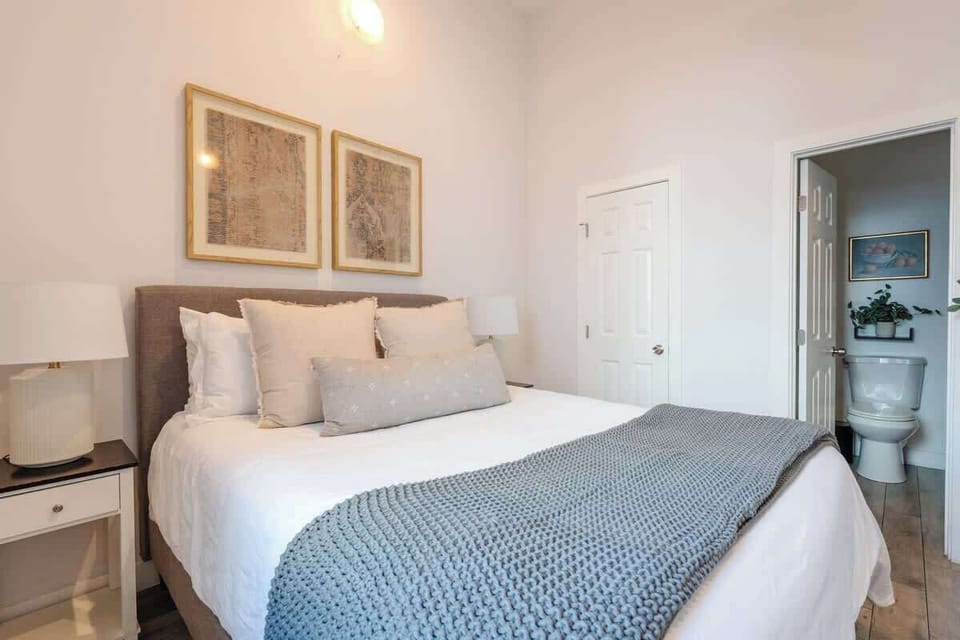 Each bedroom boasts modern furnishings and a tranquil atmosphere, ensuring a perfect getaway. This one has an attached half bathroom as well!