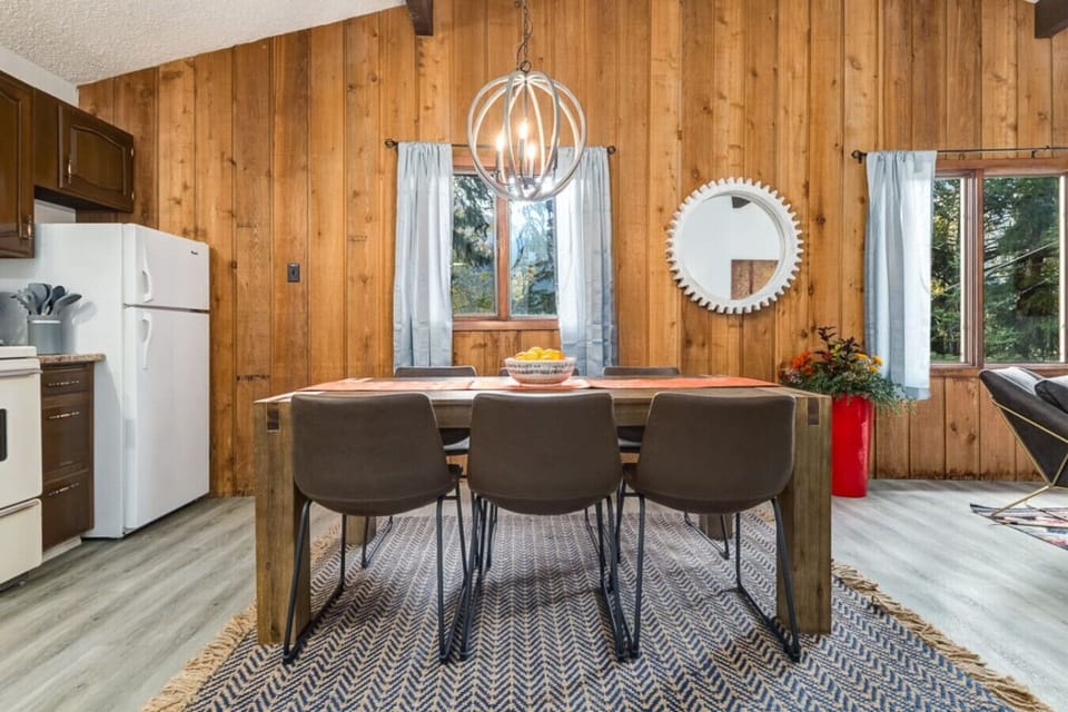 Large dining table and a full kitchen to make all your favorite meals.