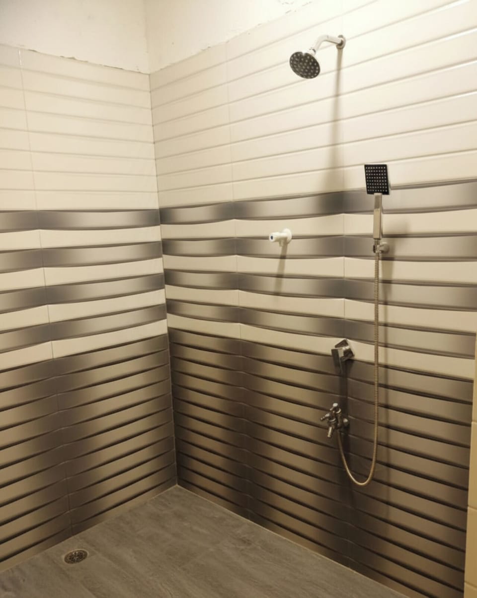 Shower, slippers, towels, soap