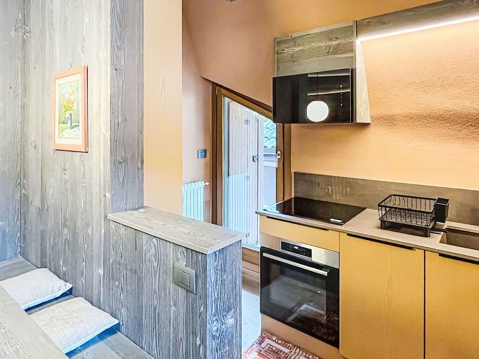 Wood, Flooring, Interior Design, Floor, Ceiling, Lighting, Room, Furniture, Countertop, Wood Stain